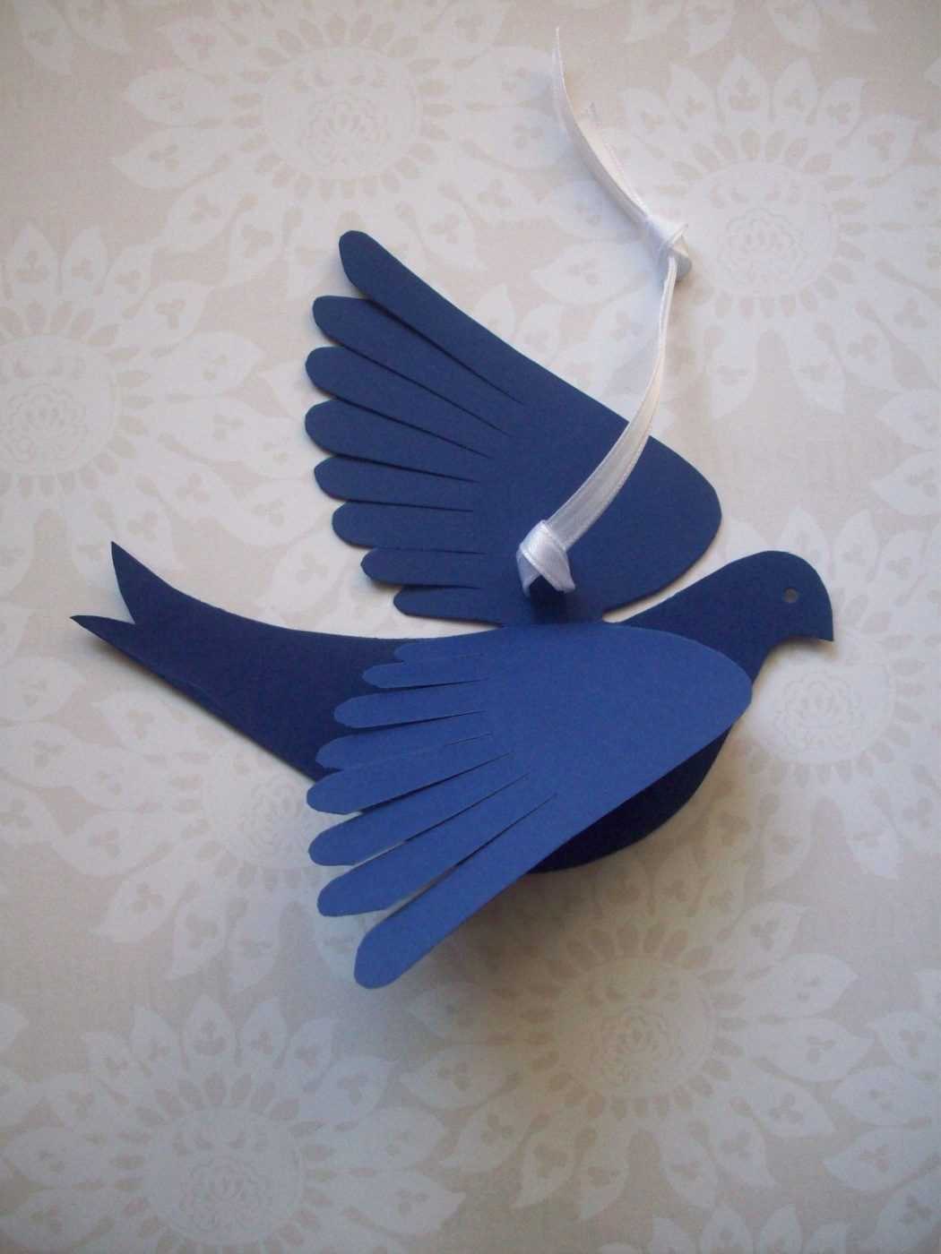 Как сделать птицу из бумаги. Оригами голубь из бумаги
